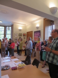 George Donald enthuses over some of the paintings at the Exhibition Opening